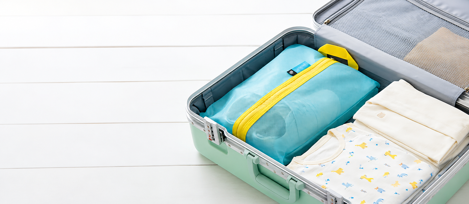pack all®のシューズバッグを使い、靴と衣類を分けてスーツケース内を整理した旅行パッキングのイメージ