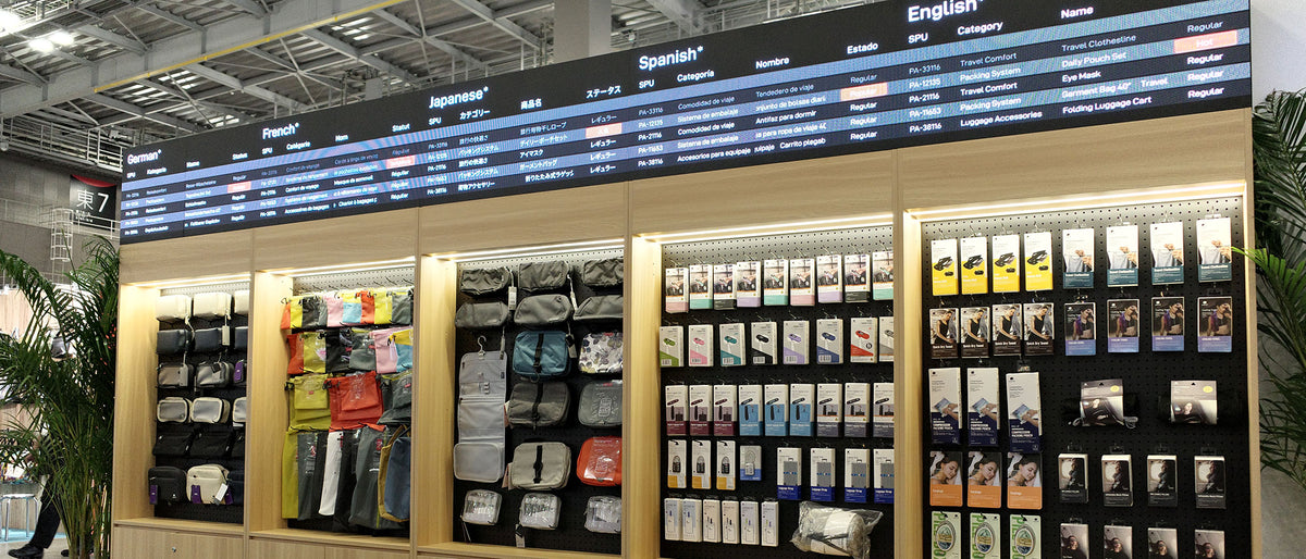 pack all®の旅行収納用品やトラベルアクセサリーをカテゴリー別に展示した東京ギフトショーの製品展示コーナー